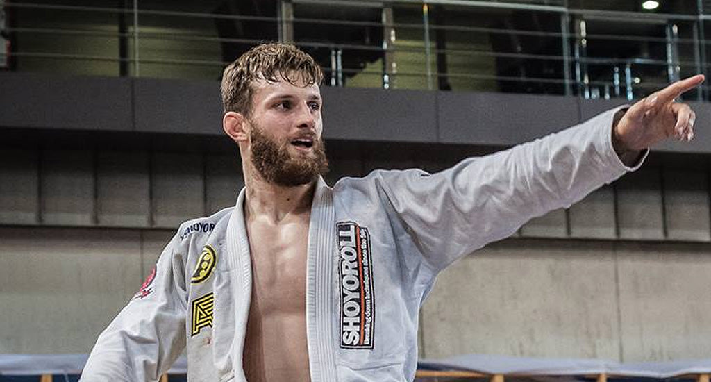Adam Wardzinksi Moves to Black Belt Heavyweight Finals After Defeating Leandro Lo