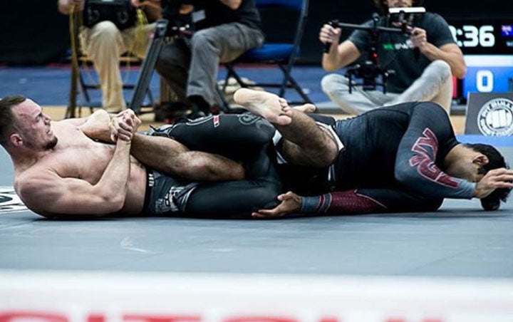 How to Properly Use a Roll to Defend a Heel Hook