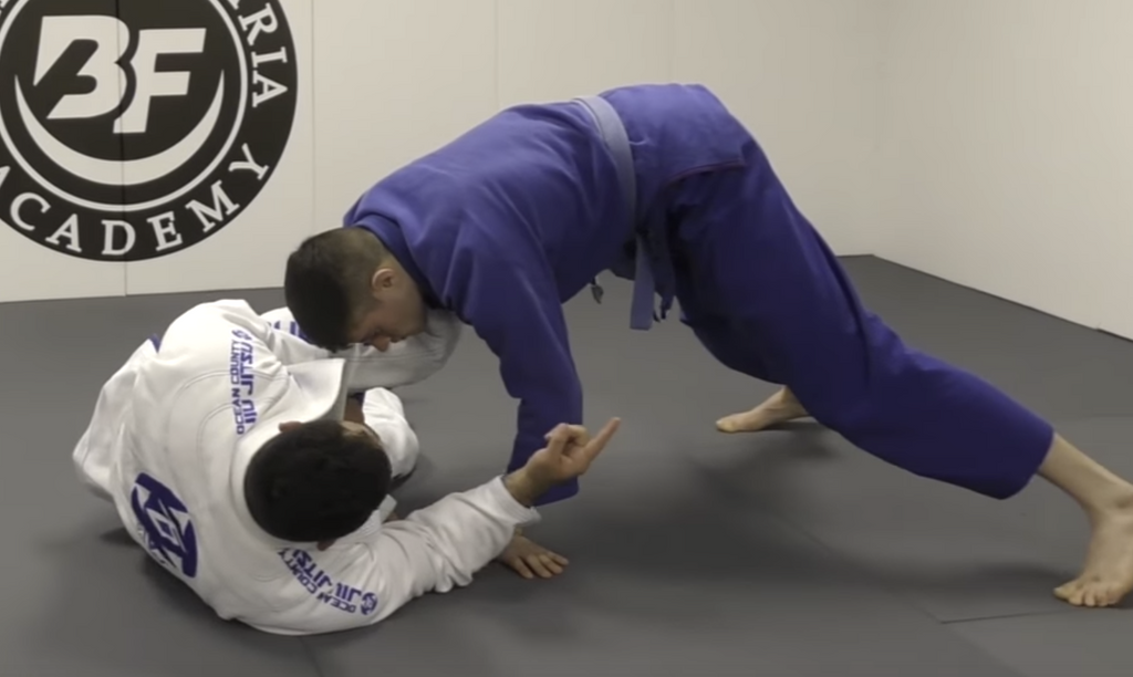 How To Do A Rolling Omoplata VS Half Guard Pass With Tom DeBlass
