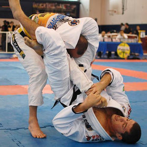 Connecting the Triangle and Armbar – BJJ Fanatics